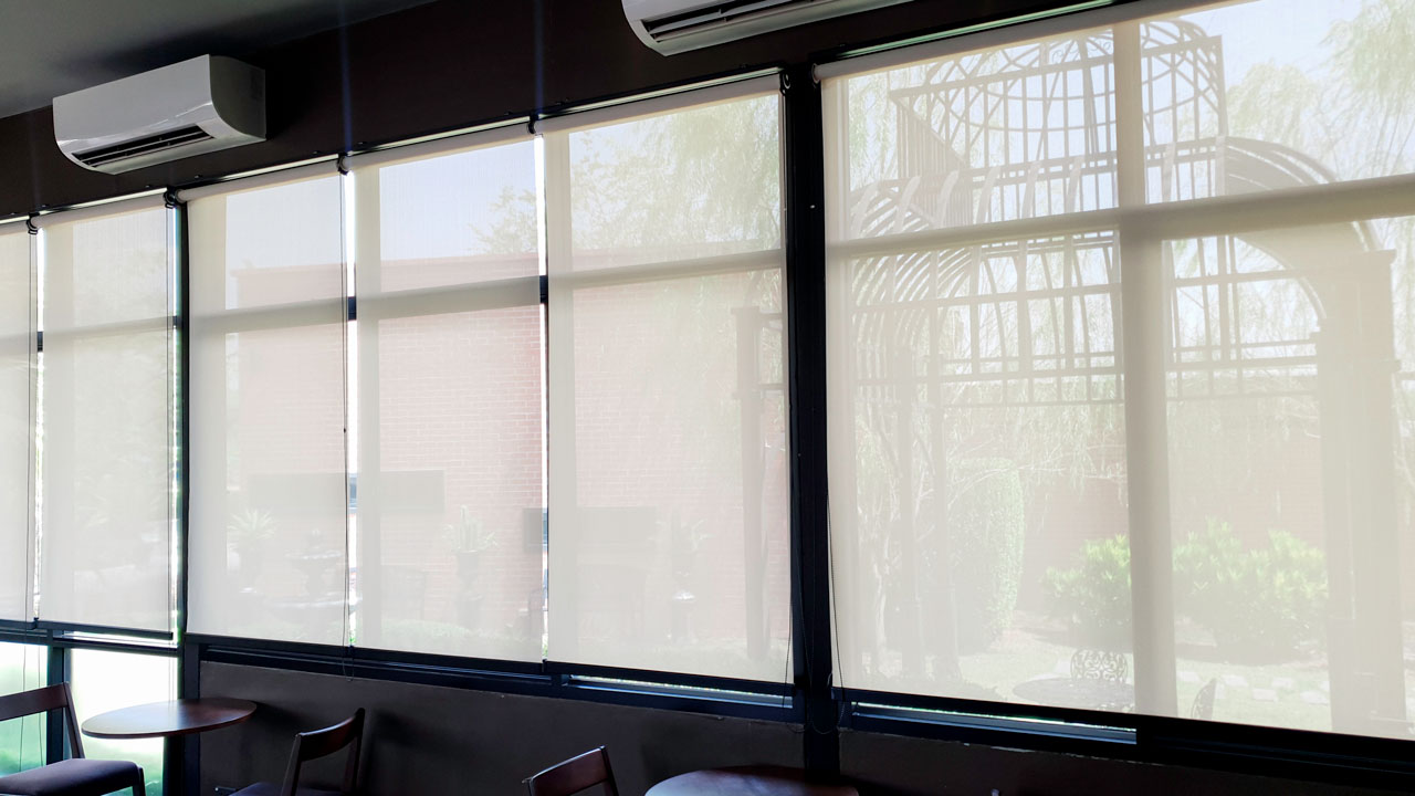 A commercial establishment with installed window coverings