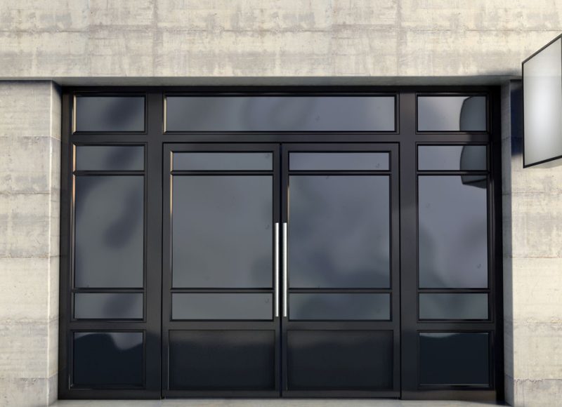 Black tinted windows of a commercial property